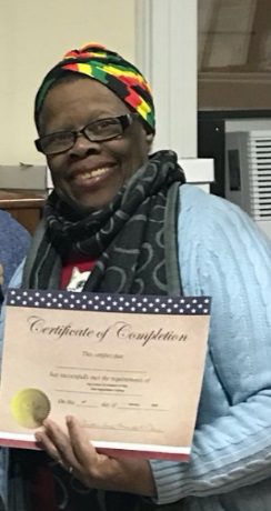 valerie hall with certificate